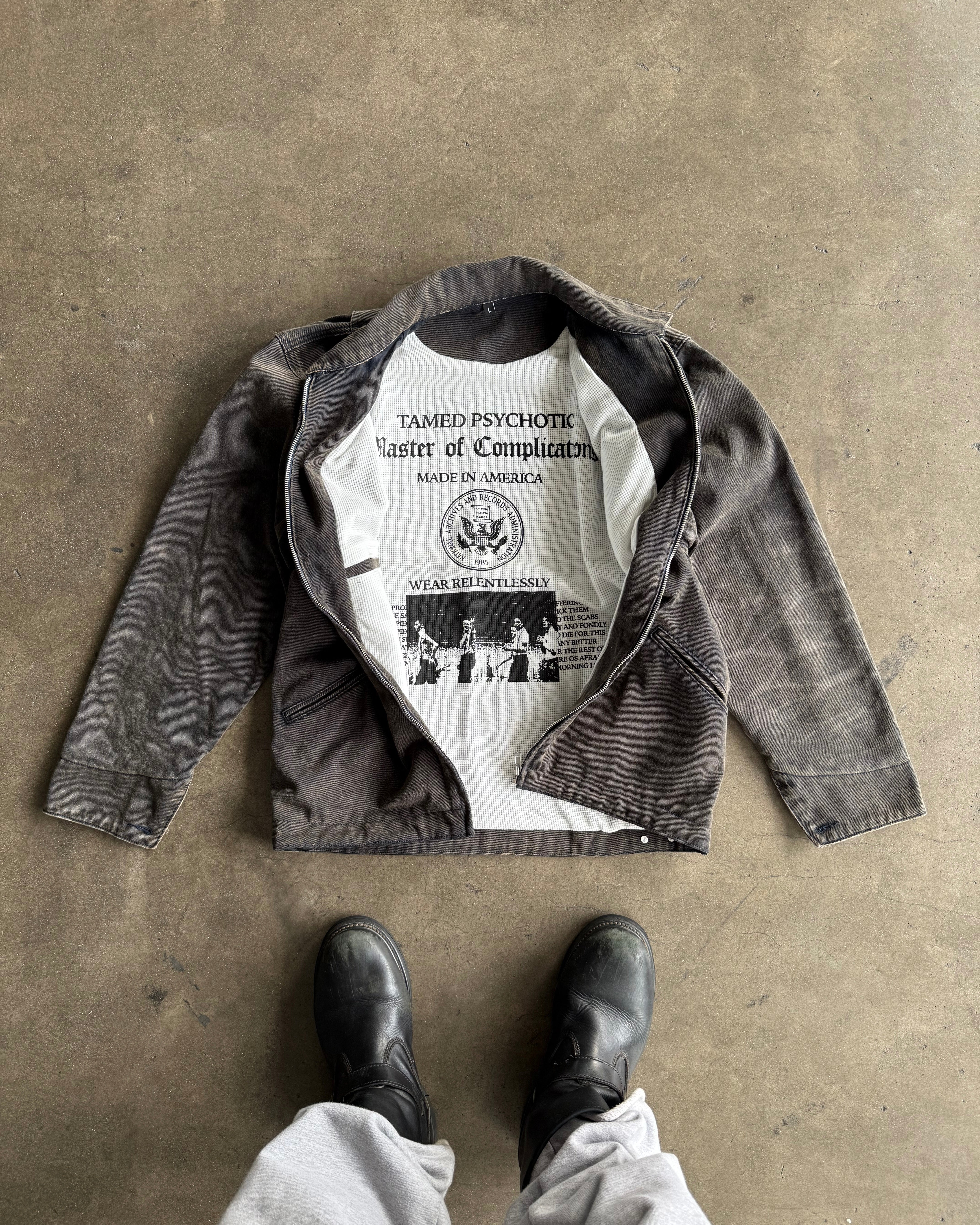 "INNER WAR" coat